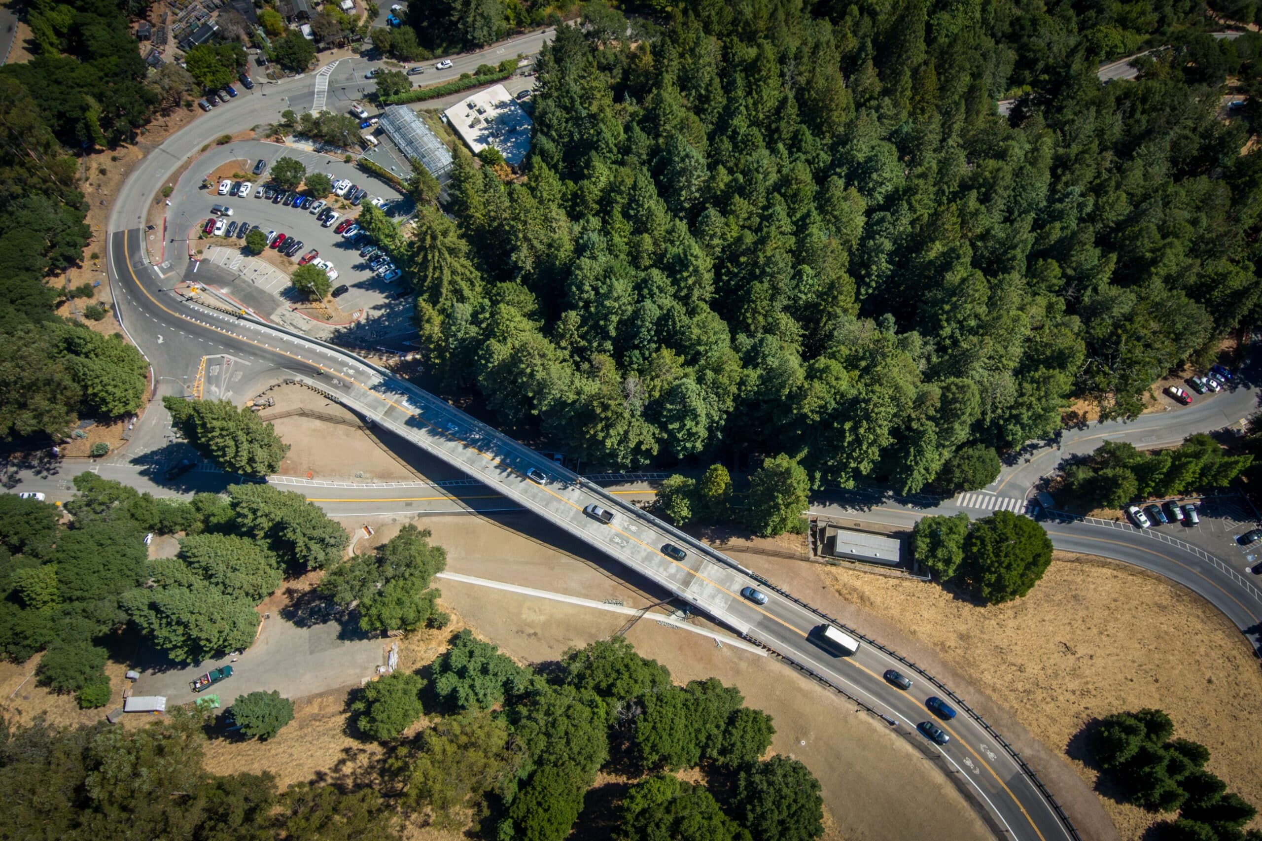 aerial view of a 3-span bridge set in hills